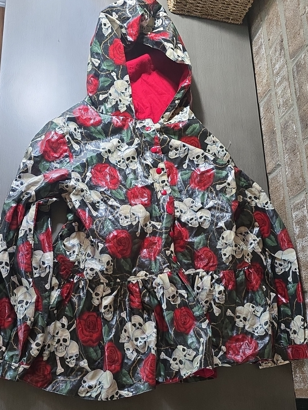 Reversible skull and rose hooded jacket